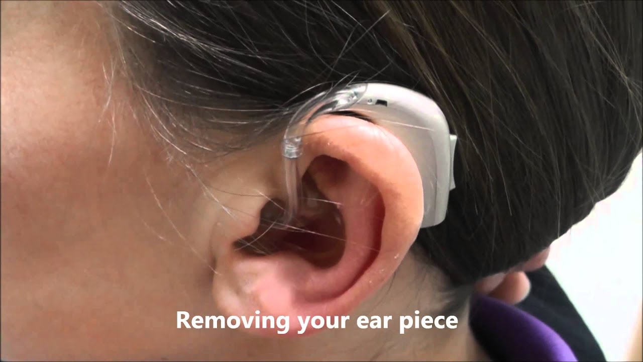 how do you put hearing aids in