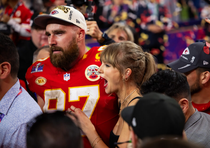 travis kelce and taylor swift on stage