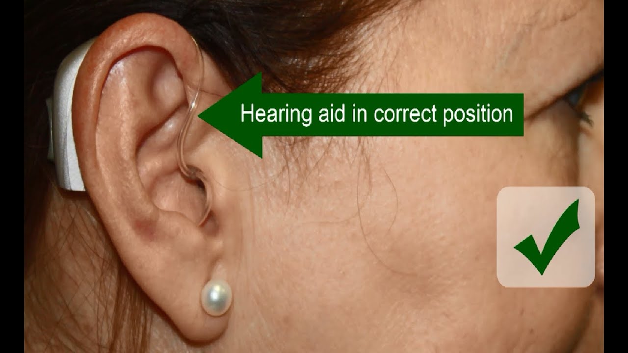 how do you put hearing aids in