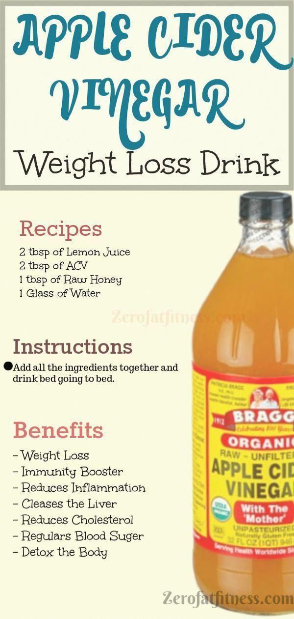 Bottle of Bragg organic raw unfiltered apple cider vinegar with a glass of diluted vinegar and lemon slice